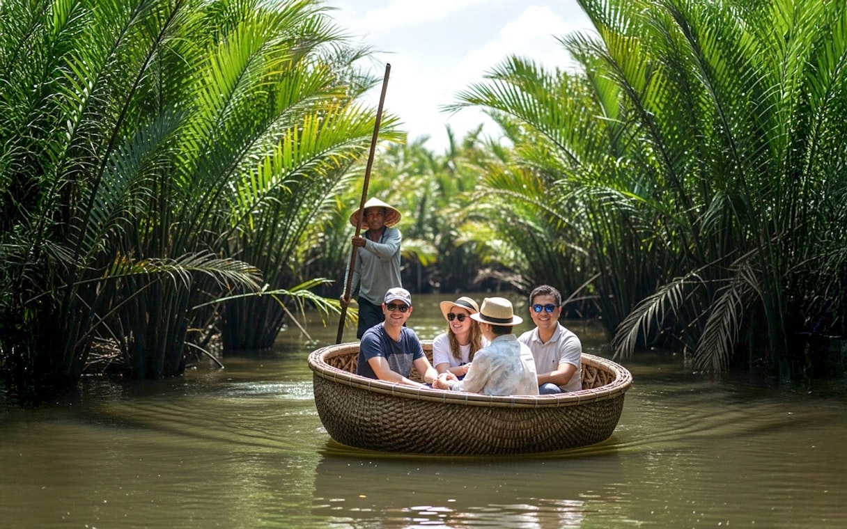 Tourists enjoying a basket boat ride through a coconut forest.