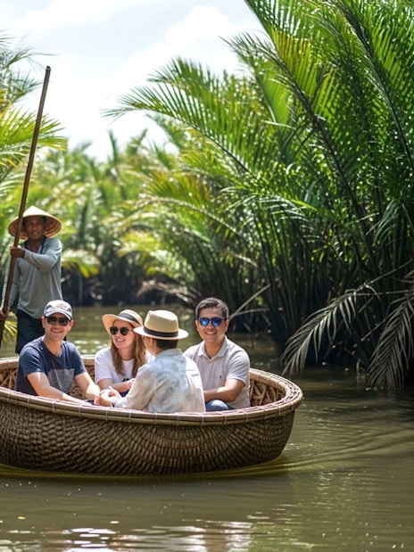 Tourists enjoying a basket boat ride through a coconut forest.