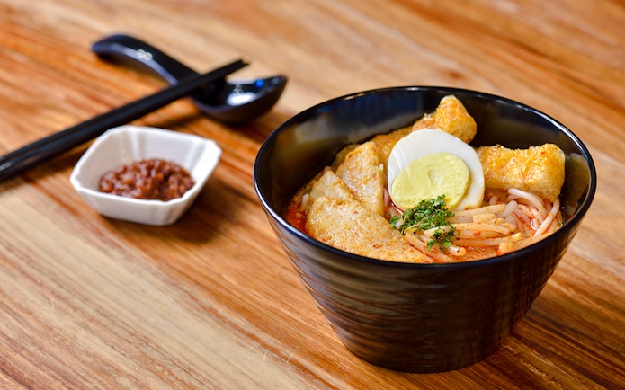 Noodle dish with egg and tofu at Plaza Premium Lounge, Singapore airport.