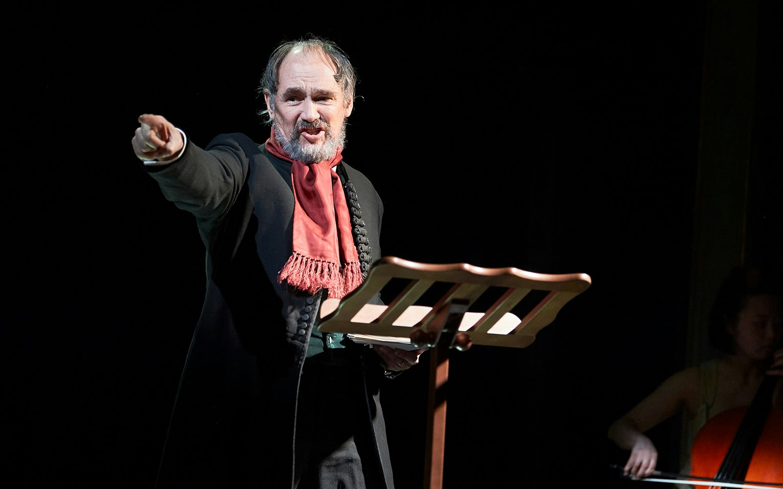 Man in period costume gestures passionately during a theatrical performance of Dr Semmelweis.