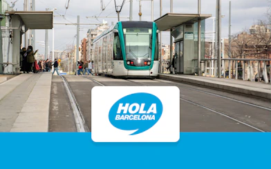 Barcelona tram at a station with passengers, promoting Hola Barcelona Travel Card Pass.