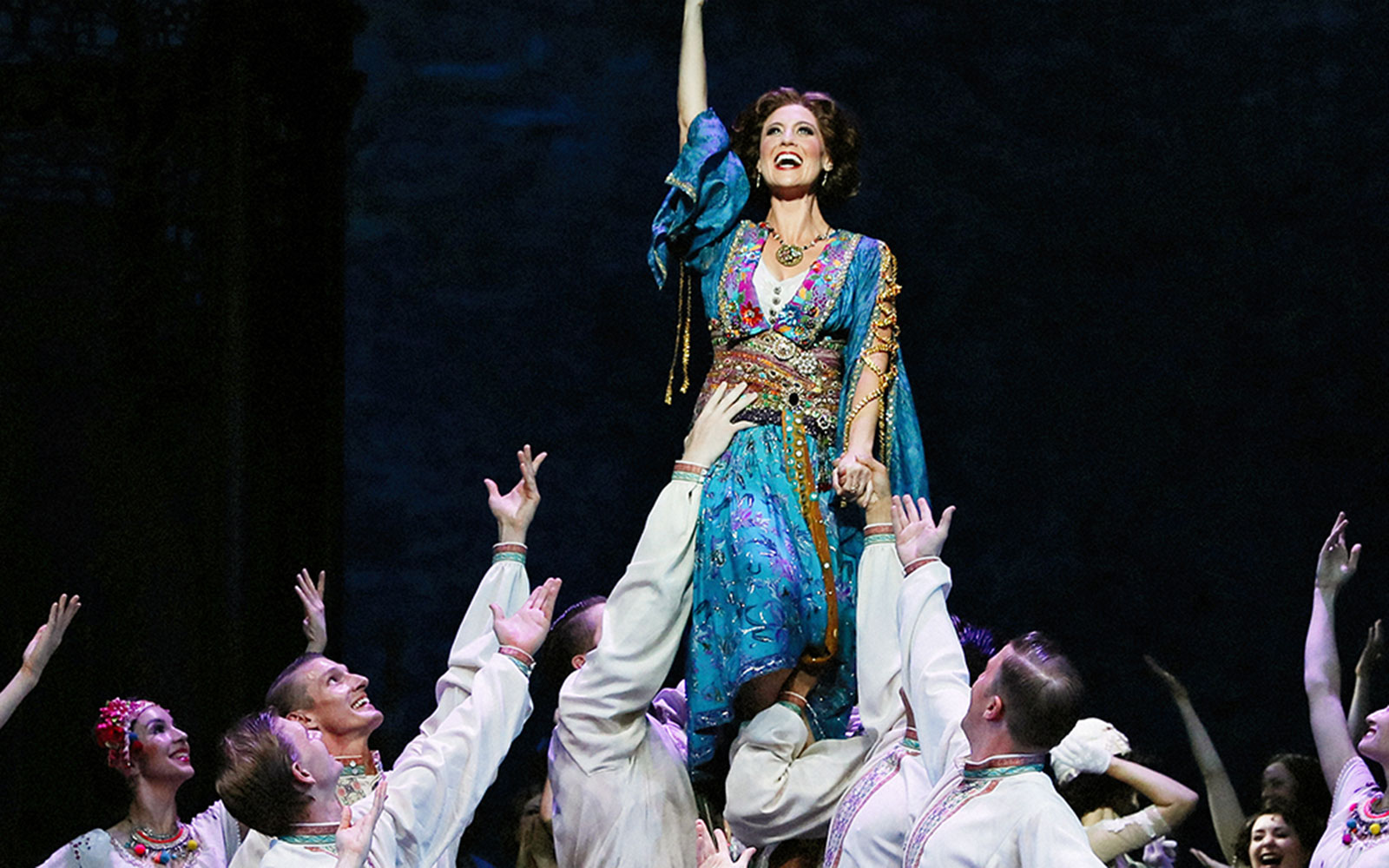 Theatrical performance of The Merry Widow in Sydney with actors in vibrant costumes.