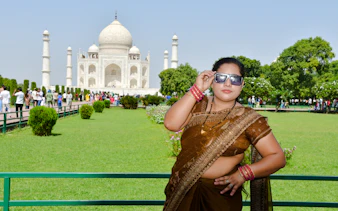 Visitor in traditional attire at the Taj Mahal, Agra.