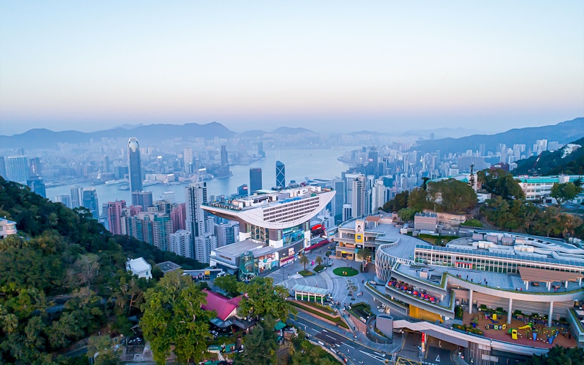 Peak Tram and Sky Terrace 428 overlooking Hong Kong skyline.