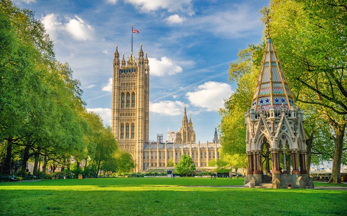 Westminster Abbey and Buxton Memorial in Victoria Tower Gardens, London.