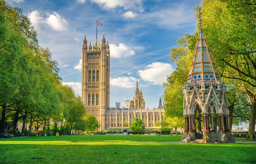 Westminster Abbey and Buxton Memorial in Victoria Tower Gardens, London.