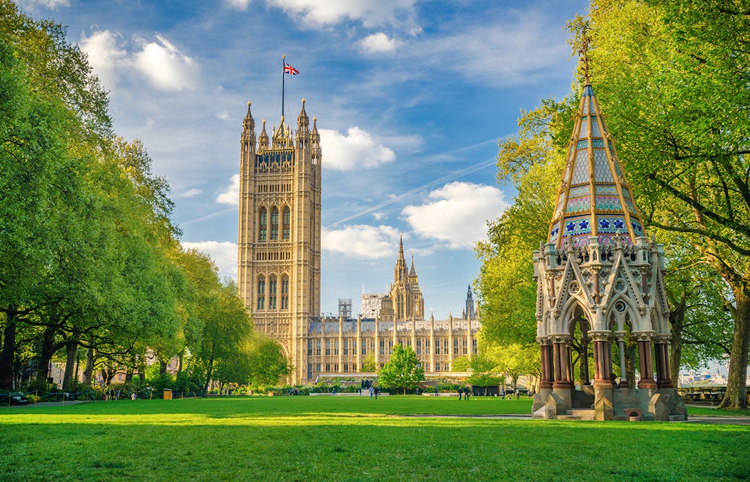 Westminster Abbey and Buxton Memorial in Victoria Tower Gardens, London.