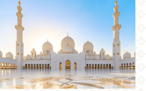 Sheikh Zayed Grand Mosque in Abu Dhabi during sunset, part of Dubai to Abu Dhabi tour.