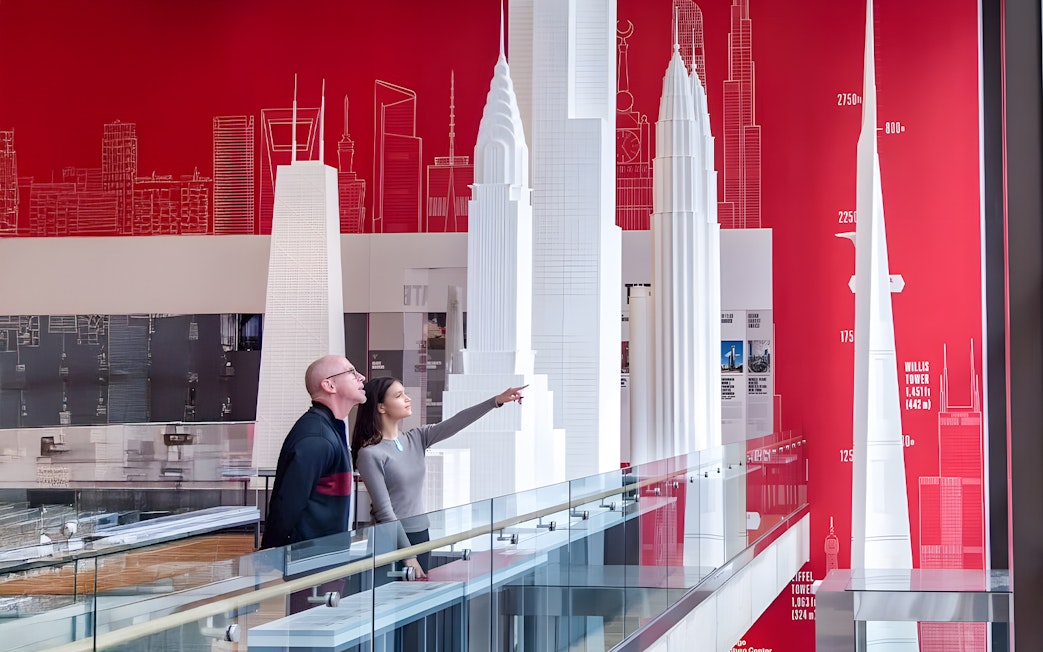 Guests exploring architectural models at the Chicago Architectural Center.