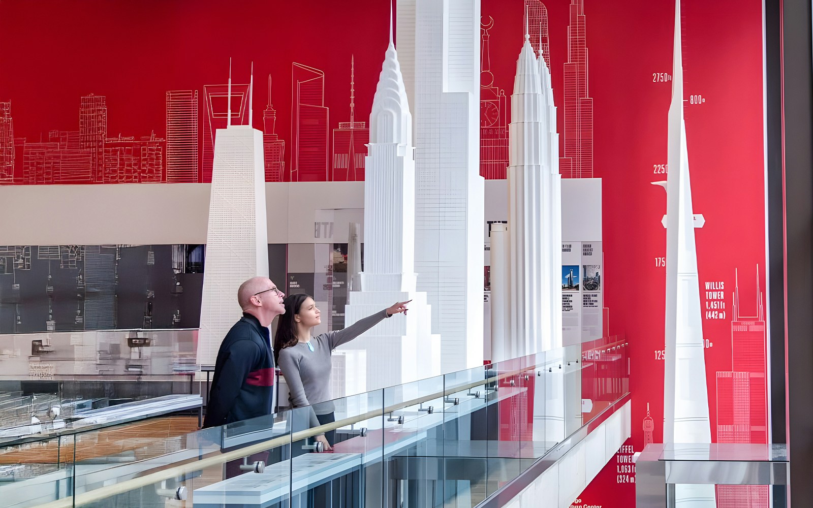 Guests exploring architectural models at the Chicago Architectural Center.
