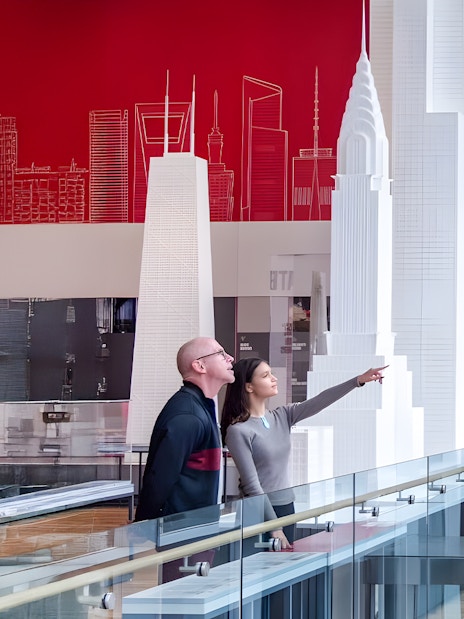 Guests exploring architectural models at the Chicago Architectural Center.
