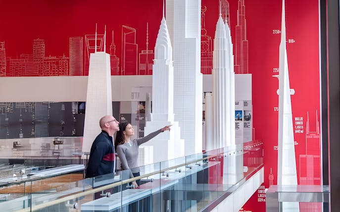 Guests exploring architectural models at the Chicago Architectural Center.