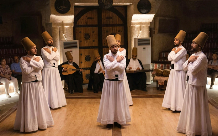 Whirling Dervishes performing in a traditional ceremony in Turkey.