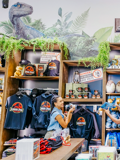 Visitors exploring Jurassic World merchandise at Gardens by the Bay.