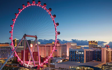 High Roller Ferris wheel illuminated at dusk near The LINQ, Las Vegas.