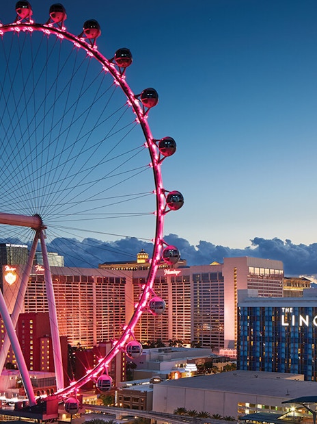 High Roller Ferris wheel illuminated at dusk near The LINQ, Las Vegas.