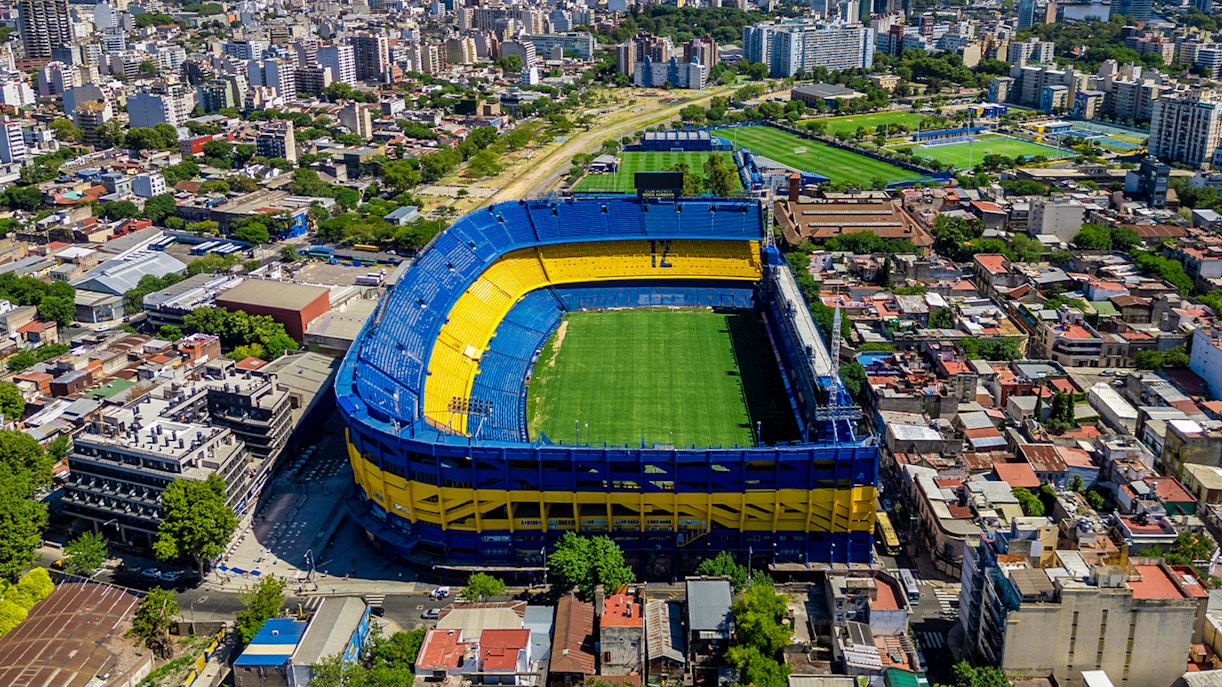 Aerial view of La Bombonera stadium in Buenos Aires, Argentina, showcasing its iconic horseshoe shape.