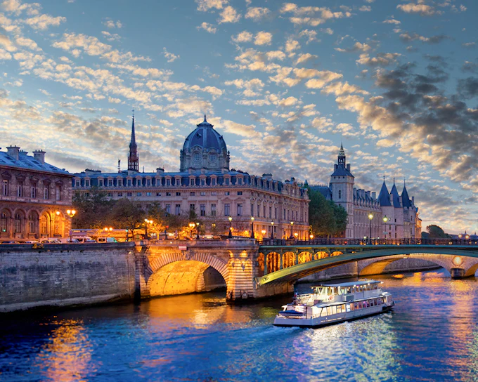 Seine River Cruise & Moulin Rouge Show with Champagne and Return Transfers