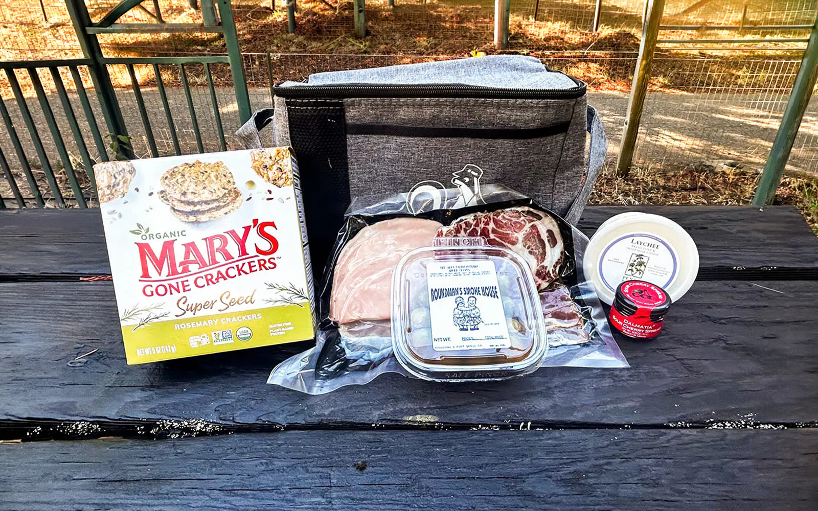 Fresh California picnic spread with crackers, meats, and cheese at Glen Blair Junction, Skunk Train.