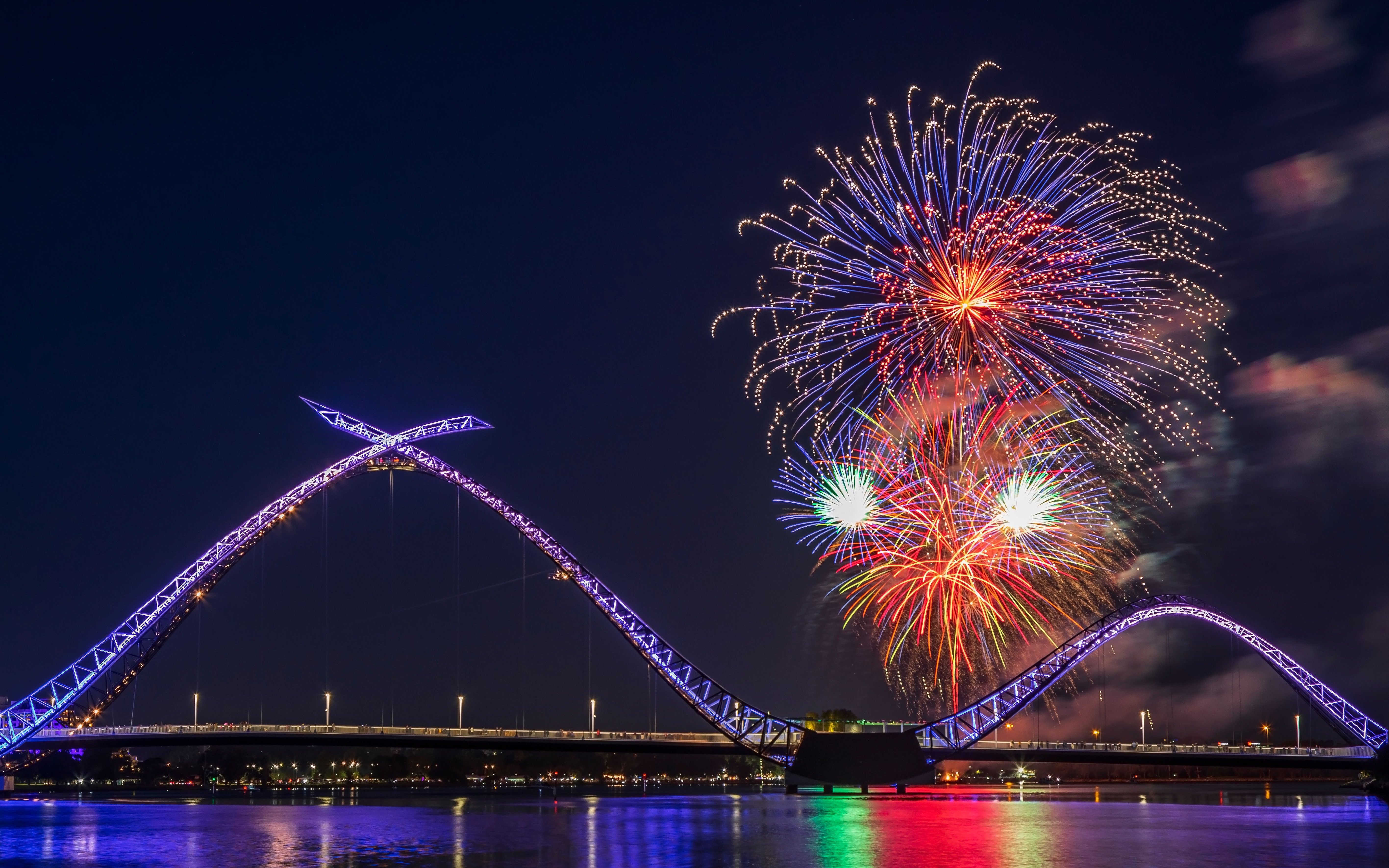 View of fireworks lighting up the sky over the Matagarup Bridge in Perth, Australia