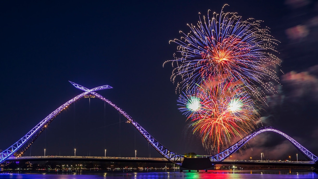 View of fireworks lighting up the sky over the Matagarup Bridge in Perth, Australia