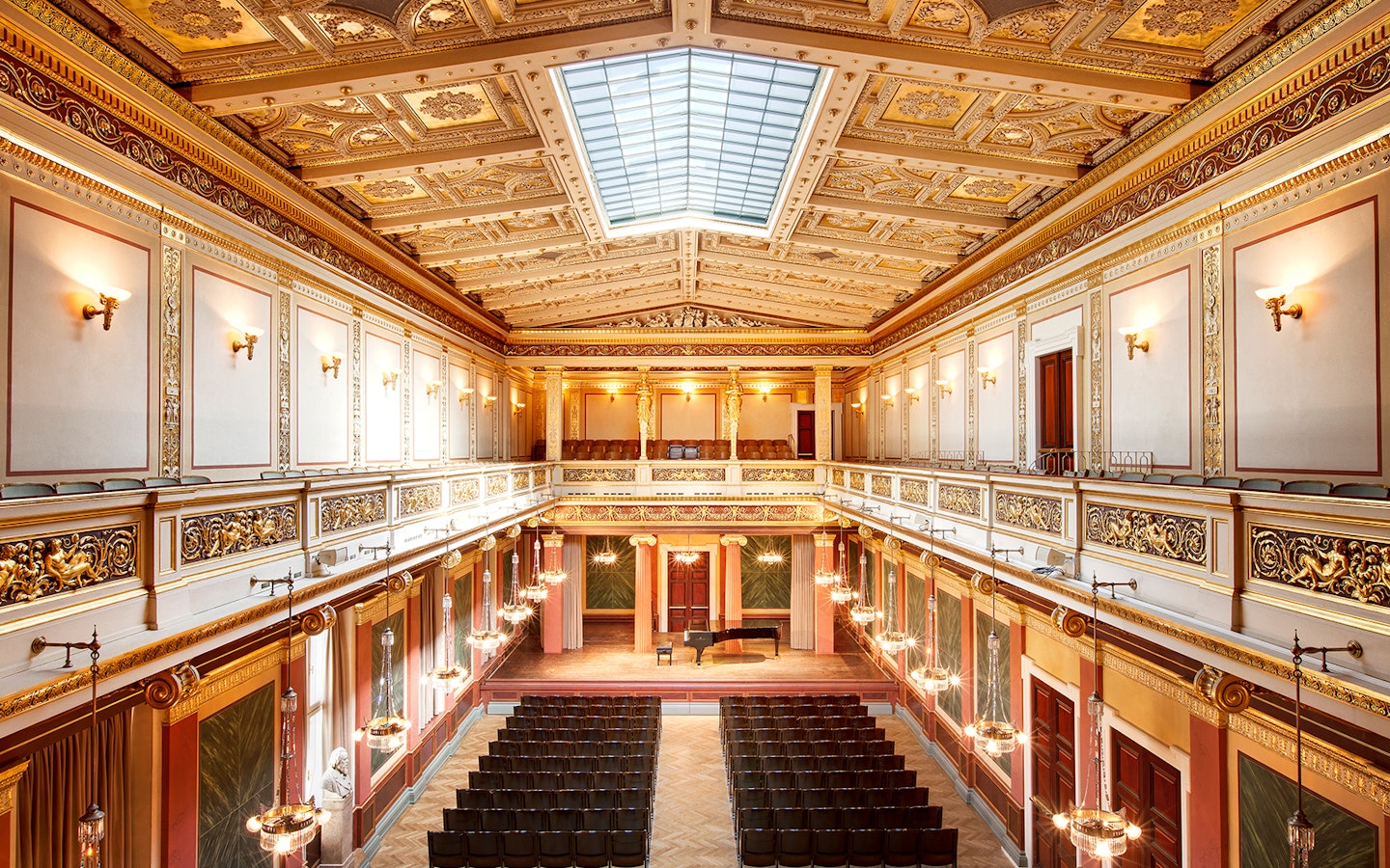 Musikverein concert hall interior with stage set for Vivaldi’s Four Seasons & Mozart concert.