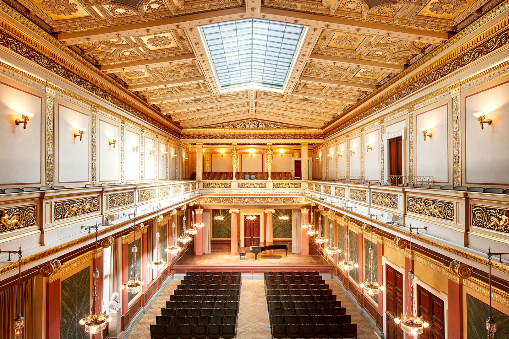 Musikverein concert hall interior with stage set for Vivaldi’s Four Seasons & Mozart concert.