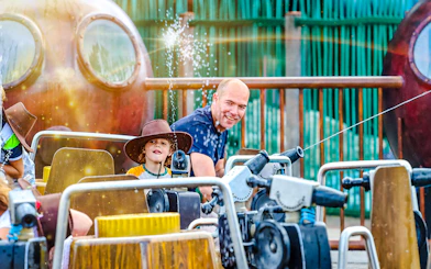 Guests enjoying a water ride at Wild West in Slagharen.
