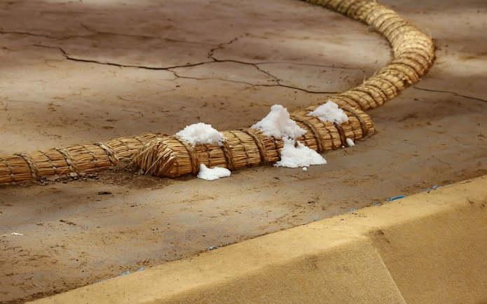 Sumo training ring with salt purification ritual in Tokyo.