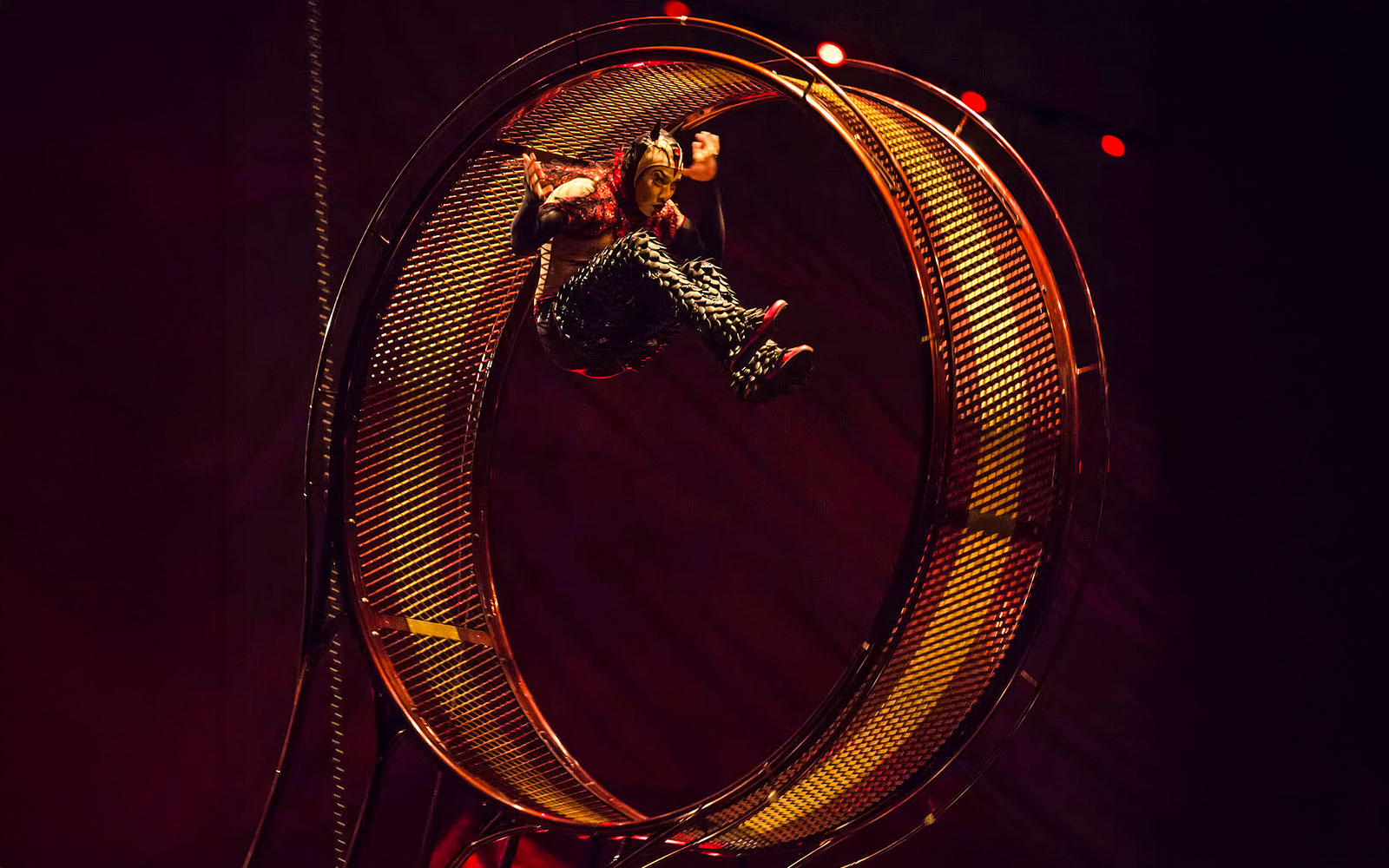 Performer inside a spinning wheel at Cirque du Soleil Kooza, Singapore.