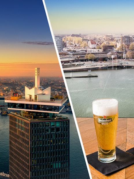 A'DAM Lookout view with Amsterdam skyline and two drinks on a table.