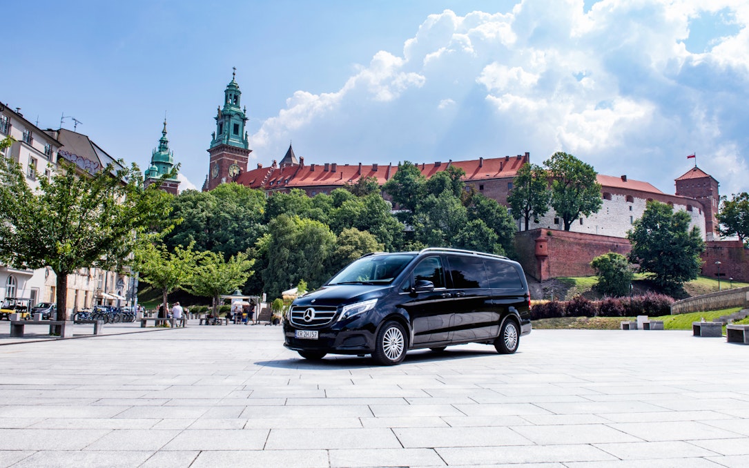 Private transfer van in front of Wawel Castle, Krakow.