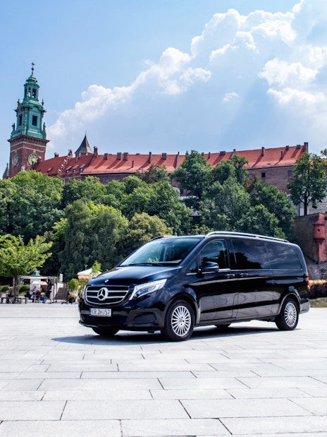 Private transfer van in front of Wawel Castle, Krakow.