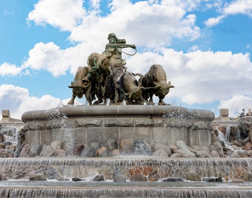 Gefion Fountain in Copenhagen, Denmark with water flowing from the sculpted figures.