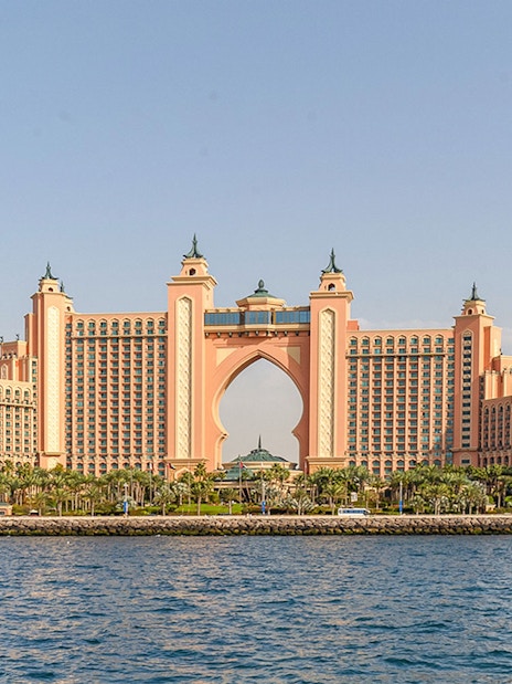 Atlantis The Palm hotel viewed from the sea during a Dubai Harbour yacht cruise.