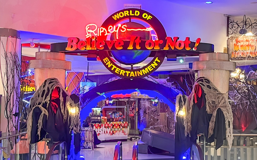 Ripley's Believe It Or Not! Museum entrance with neon sign and spooky decor.
