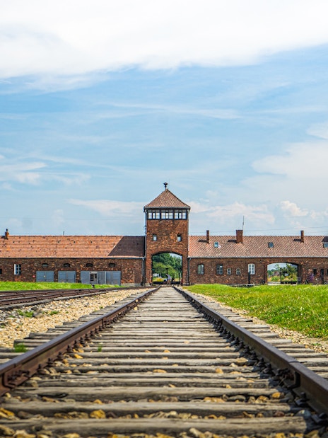 Rail tracks leading to the main gate of Auschwitz-Birkenau, Poland.