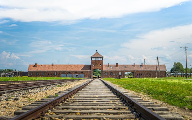 Rail tracks leading to the main gate of Auschwitz-Birkenau, Poland.