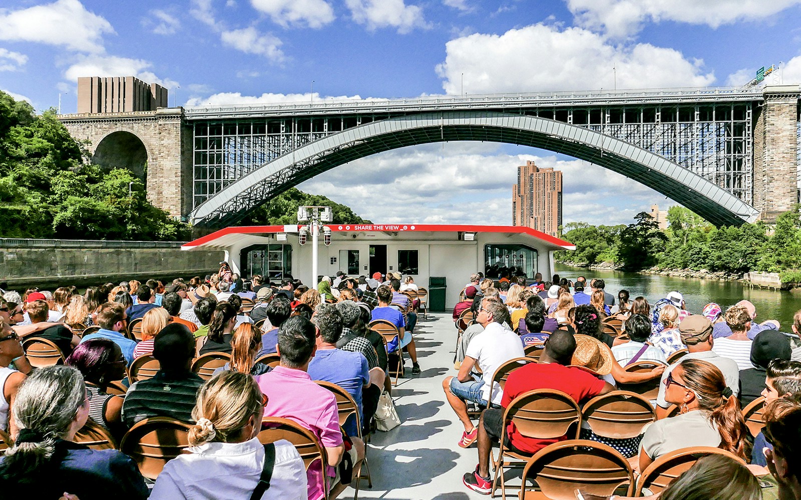 Tourists enjoying the Circle Line: 2.5hr Best of New York Full Island Cruise with a view of the city skyline