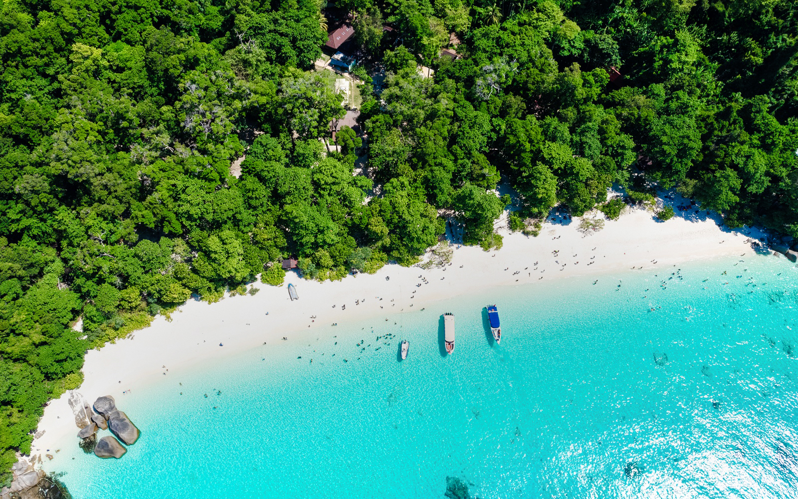 Aerial view of Island No. 4, Similan Islands, featuring white sandy beach and turquoise water.