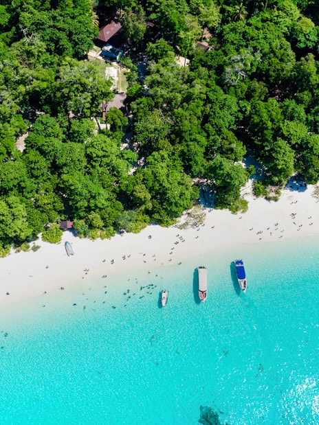 Aerial view of Island No. 4, Similan Islands, featuring white sandy beach and turquoise water.