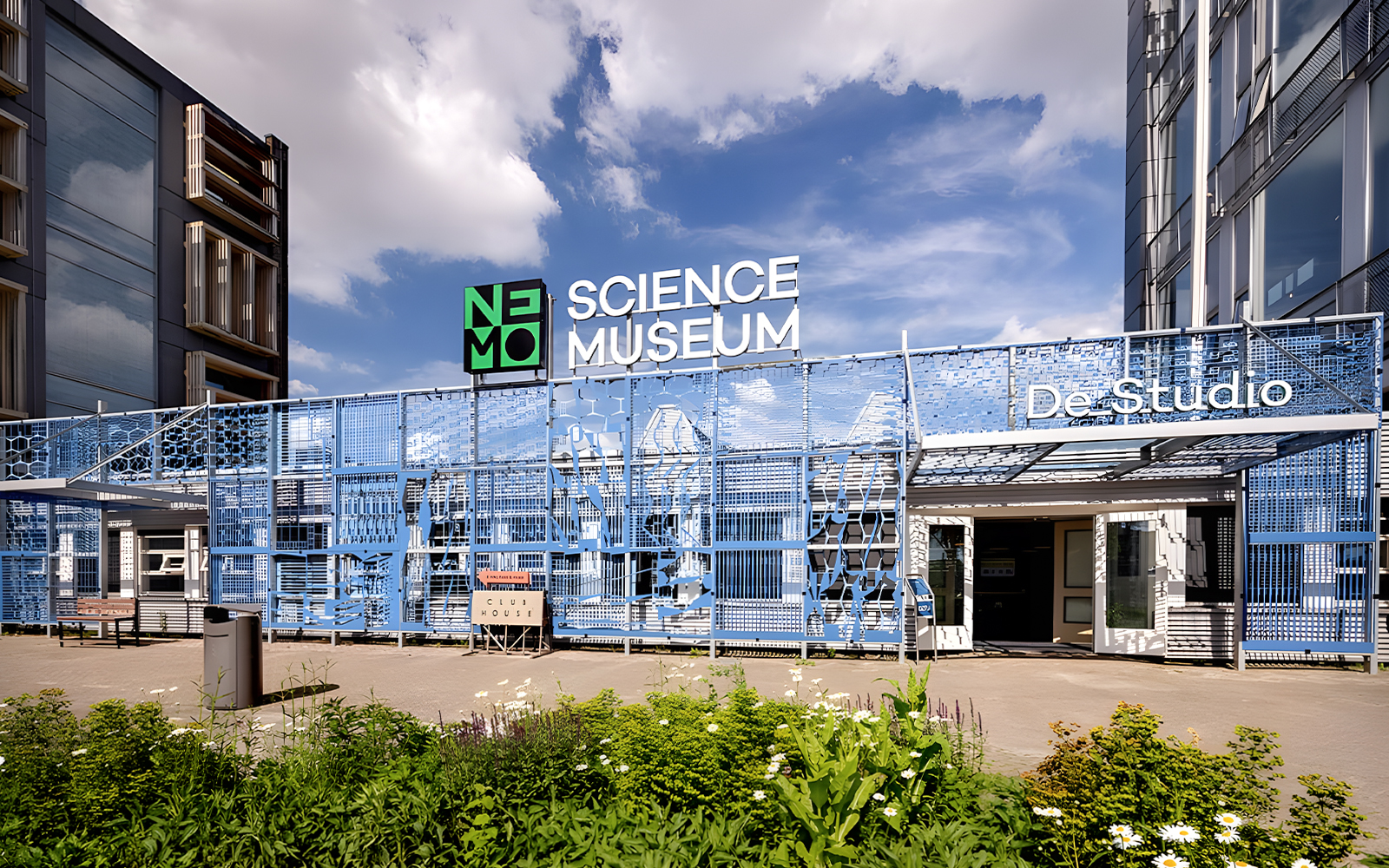 NEMO Science Museum De Studio entrance with blue facade in Amsterdam.