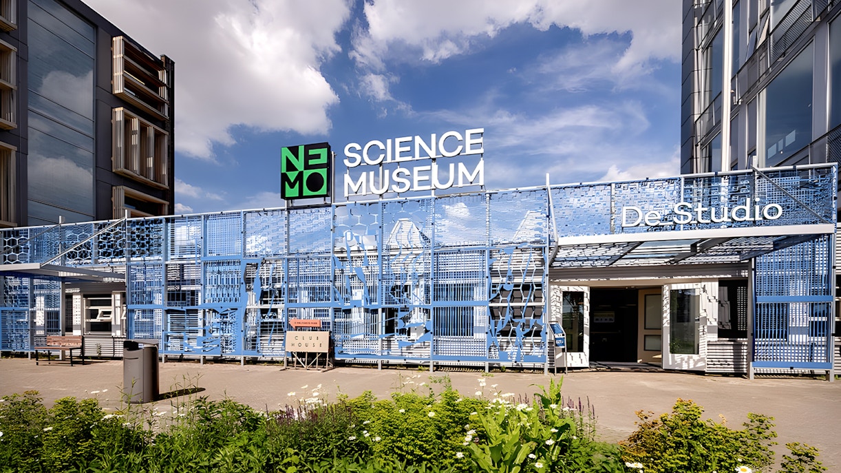 NEMO Science Museum De Studio entrance with blue facade in Amsterdam.