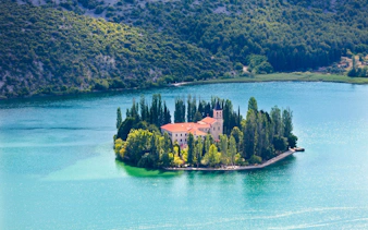 Visovac Monastery on an island in Visovac Lake, Krka National Park, Croatia.