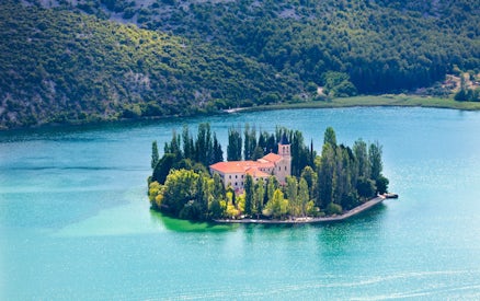 Visovac Monastery on an island in Visovac Lake, Krka National Park, Croatia.