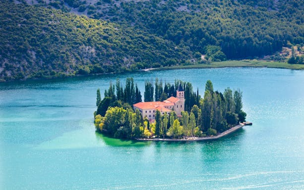 Visovac Monastery on an island in Visovac Lake, Krka National Park, Croatia.