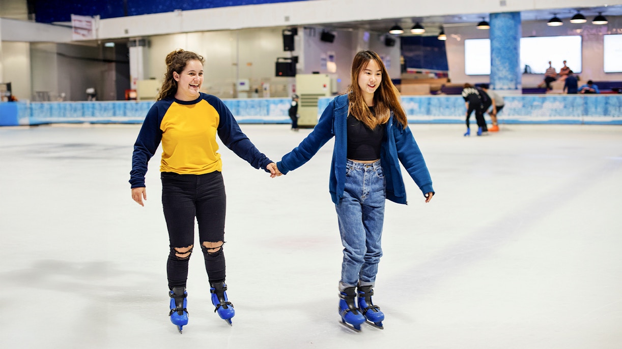 Girls ice skating at Blue Ice Snow Park, Paradigm Mall, Johor Bahru.