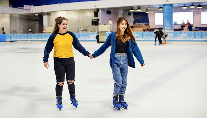 Girls ice skating at Blue Ice Snow Park, Paradigm Mall, Johor Bahru.