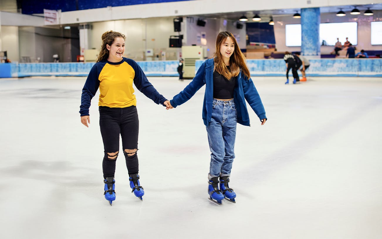 Girls ice skating at Blue Ice Snow Park, Paradigm Mall, Johor Bahru.