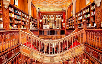 Lello Bookstore's ornate interior with wooden staircase, Porto.